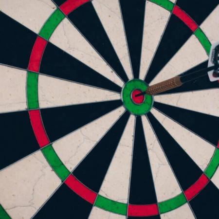 A perfect bullseye with darts.